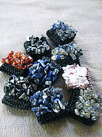 Knitted rings with semi precious stones